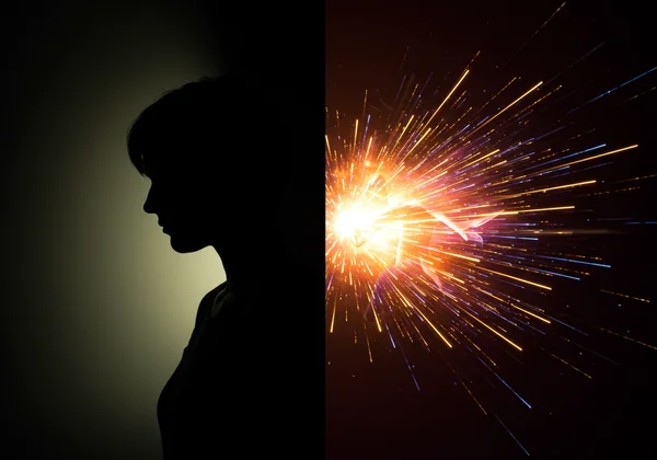 Person fühlt schwere Traurigkeit im Kontrast zu hoher Energie.