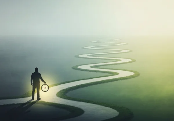 A person navigating a complex, winding path with a compass